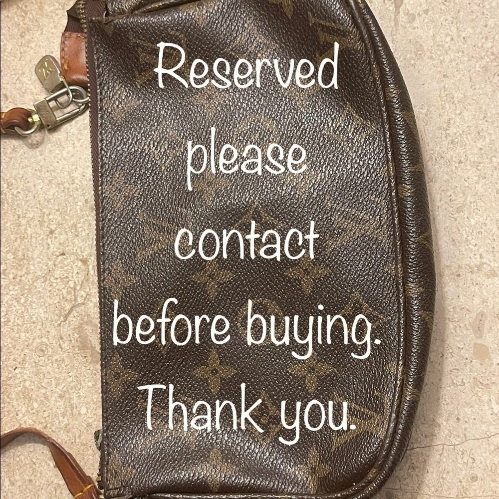 Vintage Louis Vuitton clutch